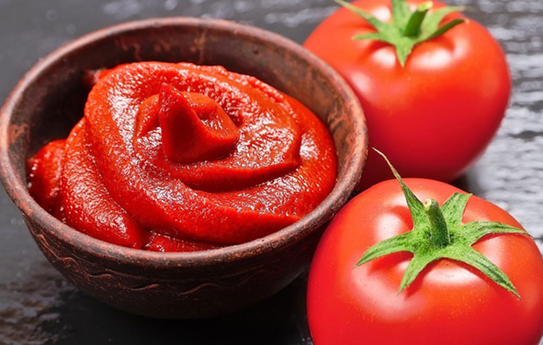 tomatoes paste black background 397020577 1200